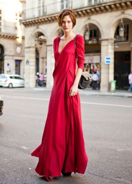 red silk maxi dress with a deep V-neckline