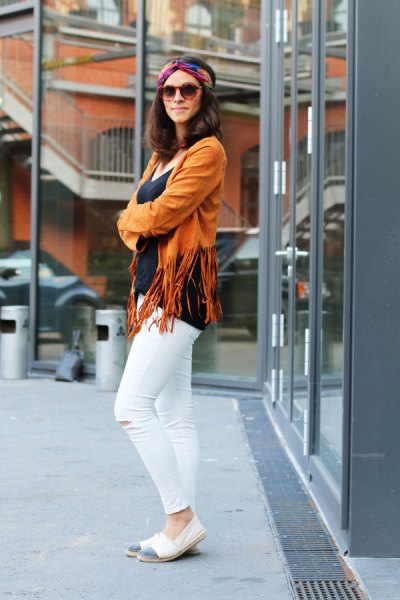 light green fringed jacket and white skinny jeans