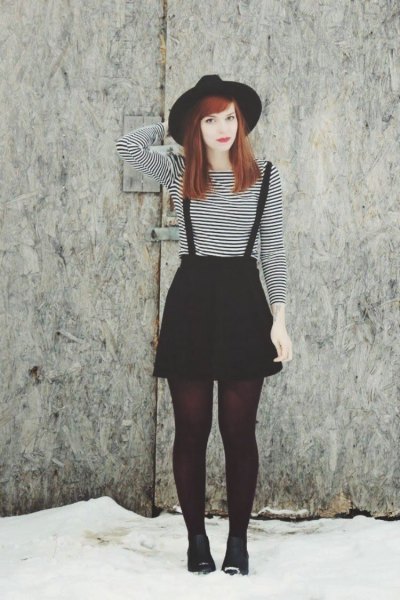 Mini skirt with black and white striped long-sleeved t-shirt