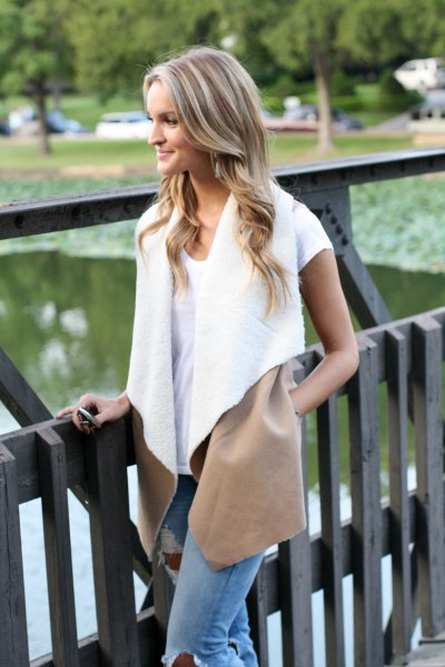 white shearling vest with t-shirt and jeans