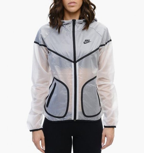 semi-transparent white Nike wind jacket with black running shorts