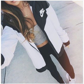 Black and white color block Nike windbreaker jacket with gray crop top