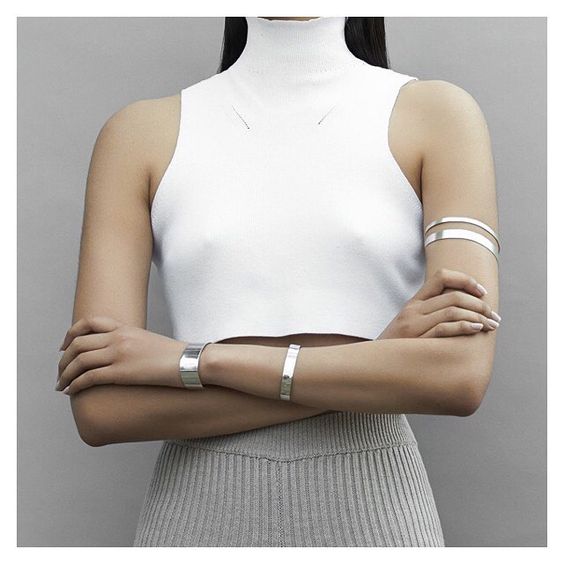 Upper arm with silver cuff bracelet