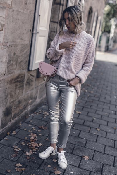Light gray ribbed crew neck sweater paired with silver skinny jeans