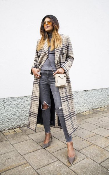 Blush pink and black maxi plaid coat with gray ripped knee jeans