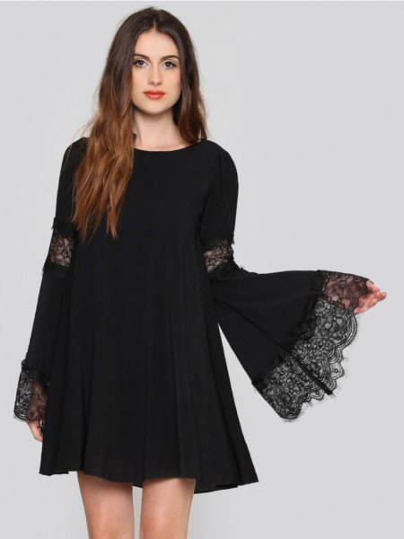 Lace details of swing dress with bell sleeves