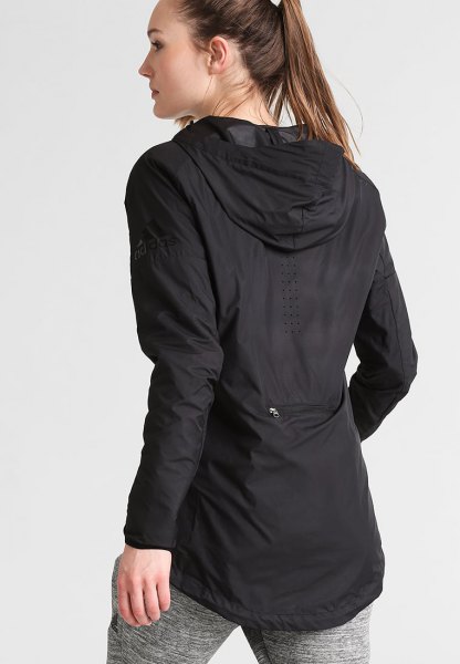 black tunic windbreaker with mottled gray cotton tights