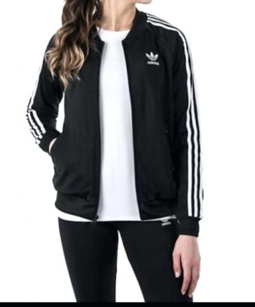 Black and white jacket with t-shirt and running shorts