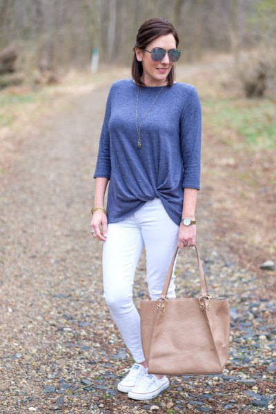 teal twist front top with white skinny jeans