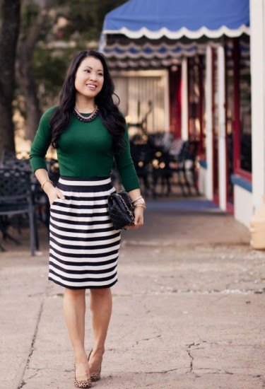 Forest green sweater black and white striped skirt