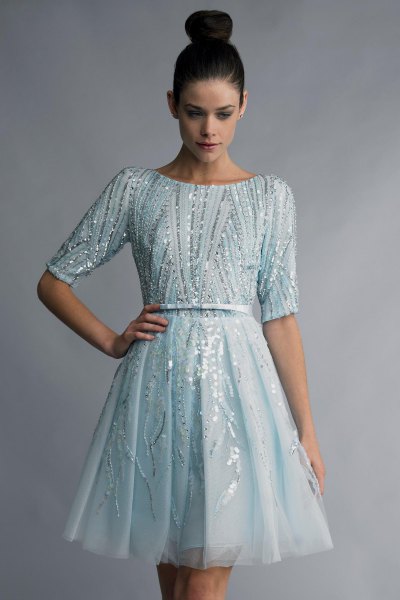 light blue cocktail dress with gathered waist and silver sequin details