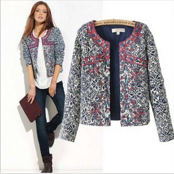 gray printed shirt jacket with white blouse and dark jeans