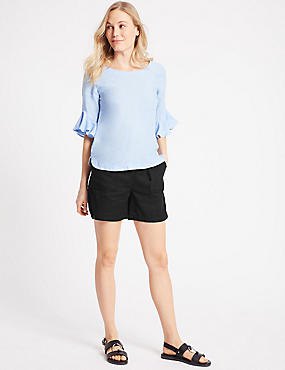 blue chiffon blouse with bell sleeves, black cargo shorts