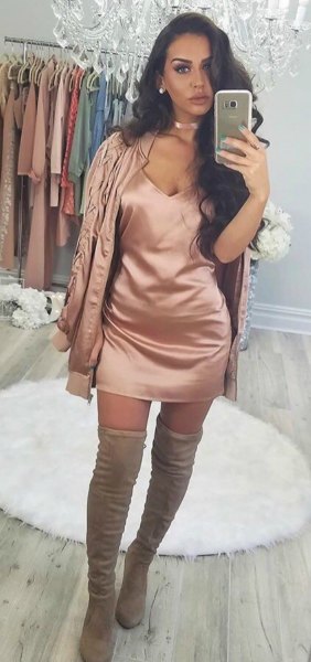 rose gold silk skirt with a deep V-neckline and matching jacket