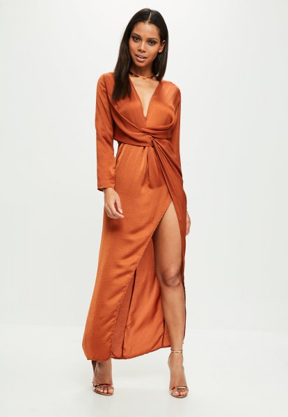 long-sleeved, deep wrap dress with a plunging V-neckline