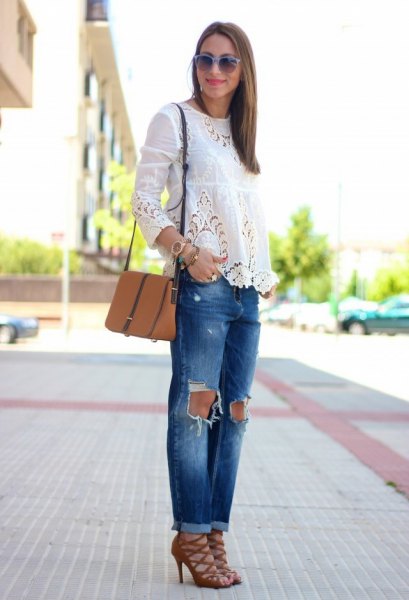 white long sleeve blouse with ripped jeans and red lace-up shoes