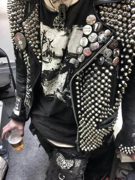 Leather jacket with studs and graphic t-shirt