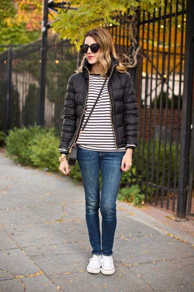 black and white striped t-shirt with bubble jacket and sneakers