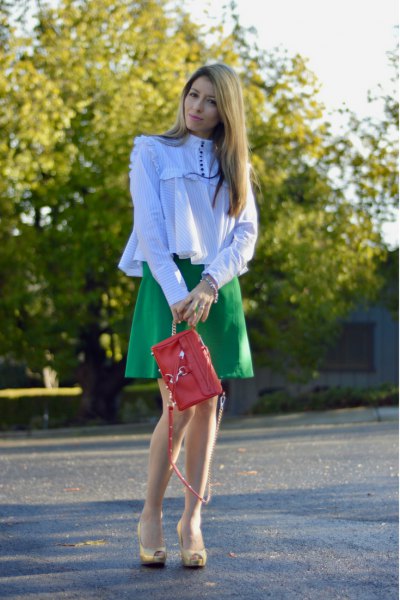 long sleeve shirt with white ruffle, faux neckline and camel skater skirt