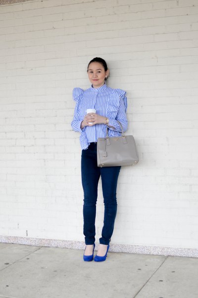 blue and white striped ruffle shoulder blouse with dark skinny jeans