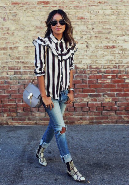 black and white striped button down shirt and ripped jeans