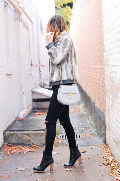light gray jacket with black skinny jeans and black leather boots
