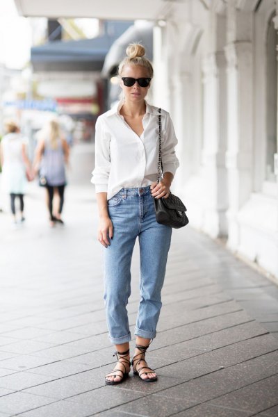 white button down shirt and light blue cuffed relaxed fit jeans