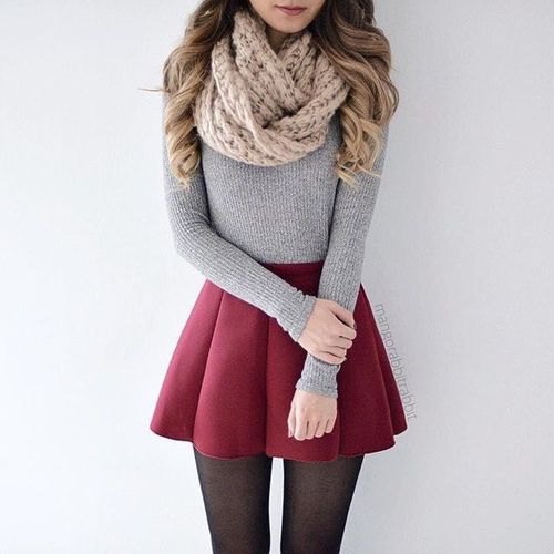 Cable knit scarf with fitted gray sweater and maroon pleated mini skirt