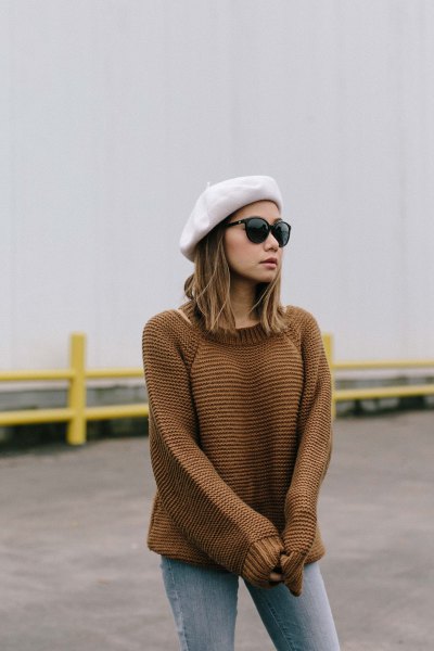 white painter's hat with knit sweater and gray jeans