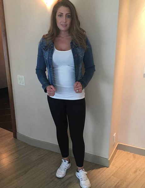 blue denim jacket with white fitted tank top and leggings