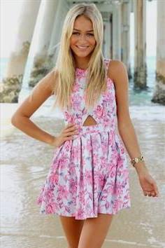 white and pink mini skater dress with a floral print on the front