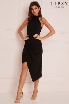 black midi wrap dress with deep halter neck and silver open toe heels