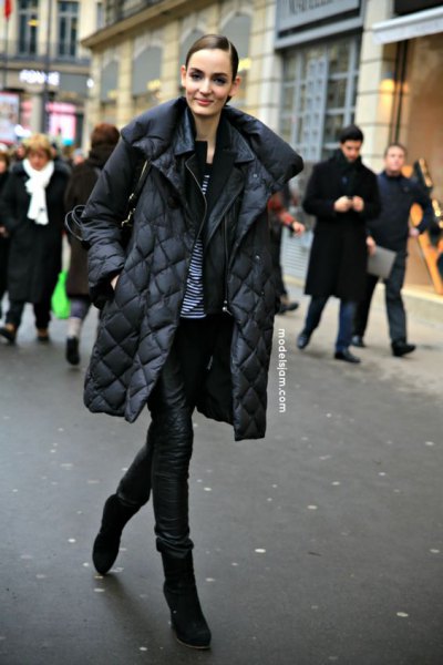 black quilted puffer coat with leather trousers and boots