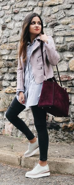 gray short suede jacket with blue and white striped tunic shirt