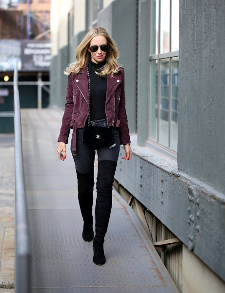 black moto jacket with mock-neck sweater and overknee boots