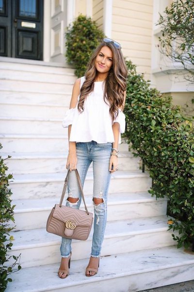 white cold shoulder chiffon blouse and ripped slim fit jeans