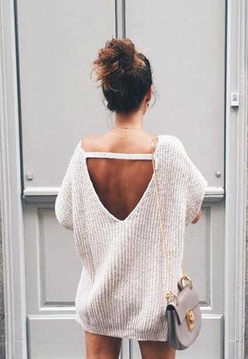 White chunky oversized sweater with open back and mini shorts