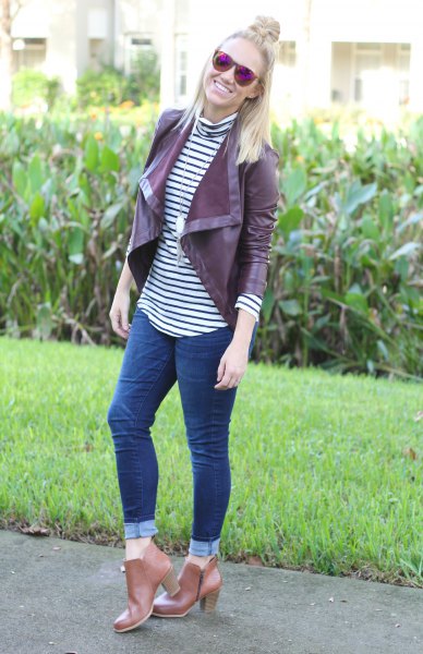 Maroon leather jacket with a black and white striped mandarin collar t-shirt