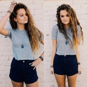 gray and white striped t-shirt with dark blue mini shorts