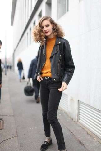 Mustard yellow sweater with black leather jacket and dark gray skinny jeans