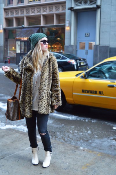 Leopard print fleece jacket, jeans and white snow boots