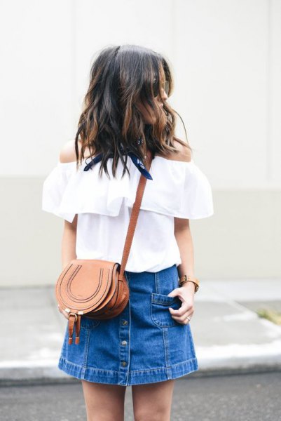 white strapless blouse with blue mini skirt