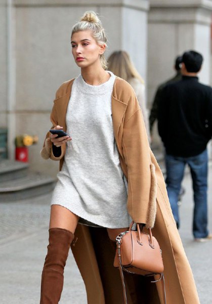 Camel longline jacket with a gray sweater dress and a small brown handbag