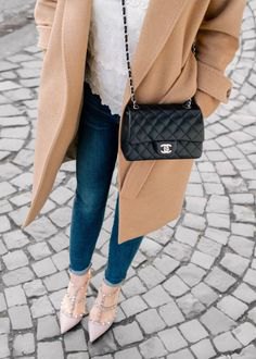 Crepe long wool coat with a black quilted small leather handbag