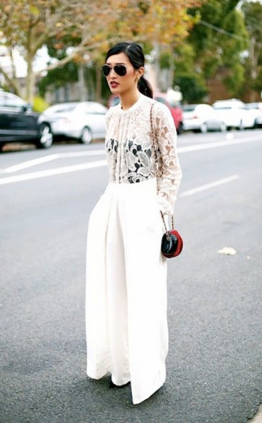 white lace blouse with wide trousers
