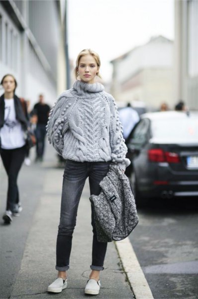 Chunky sweater cuffed jeans with a gray turtleneck