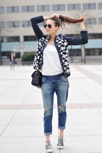 black and white printed leather jacket with really ripped jeans