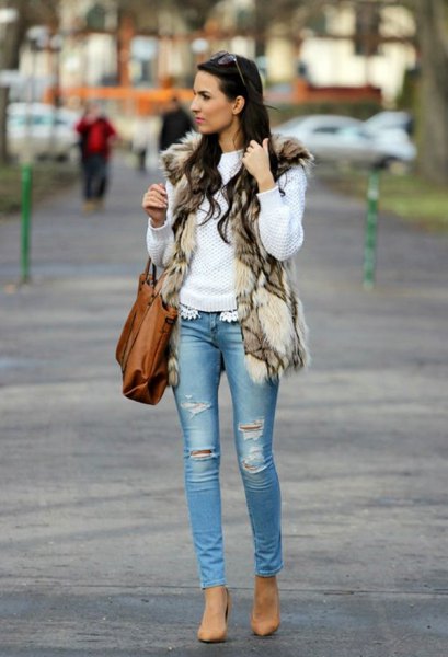 white knit sweater with brown and black printed faux fur vest