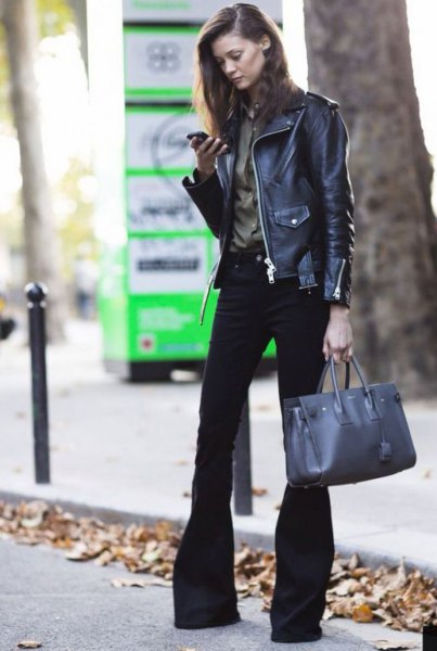 black leather biker jacket with burgundy shirt and flared jeans