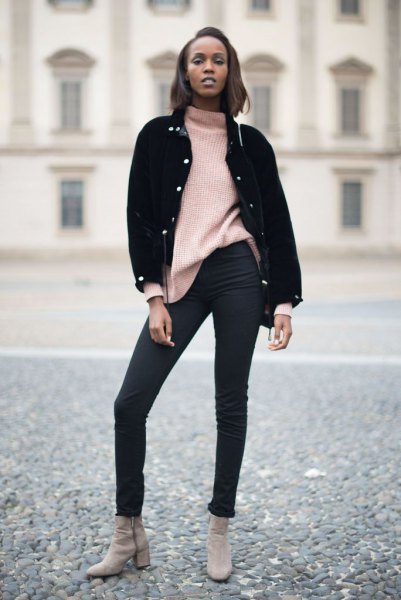 black denim jacket with ivory chunky sweater and skinny jeans